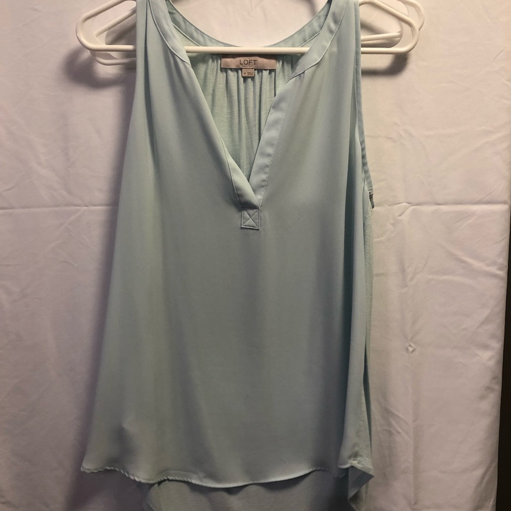 Split neck sleeveless blouse